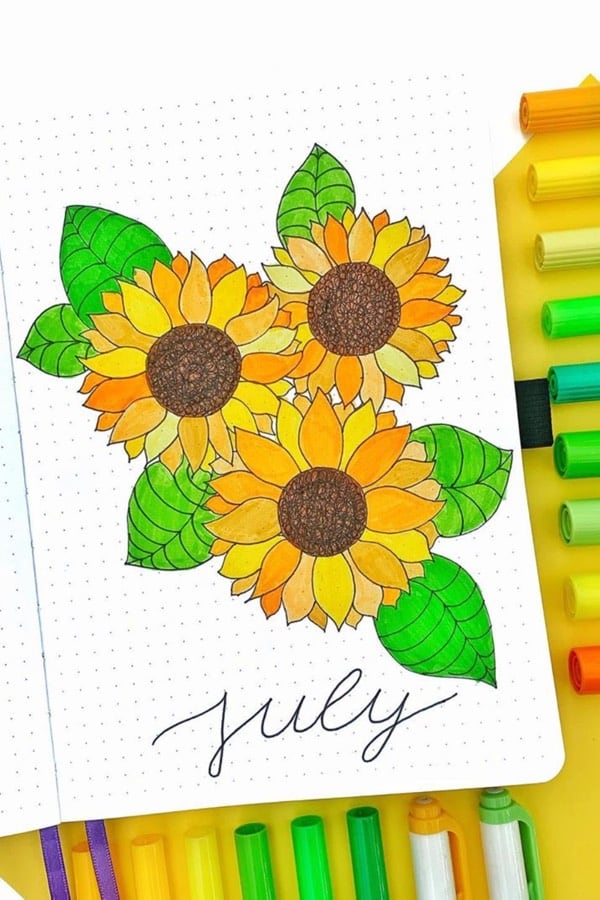 july cover spread with sunflowers