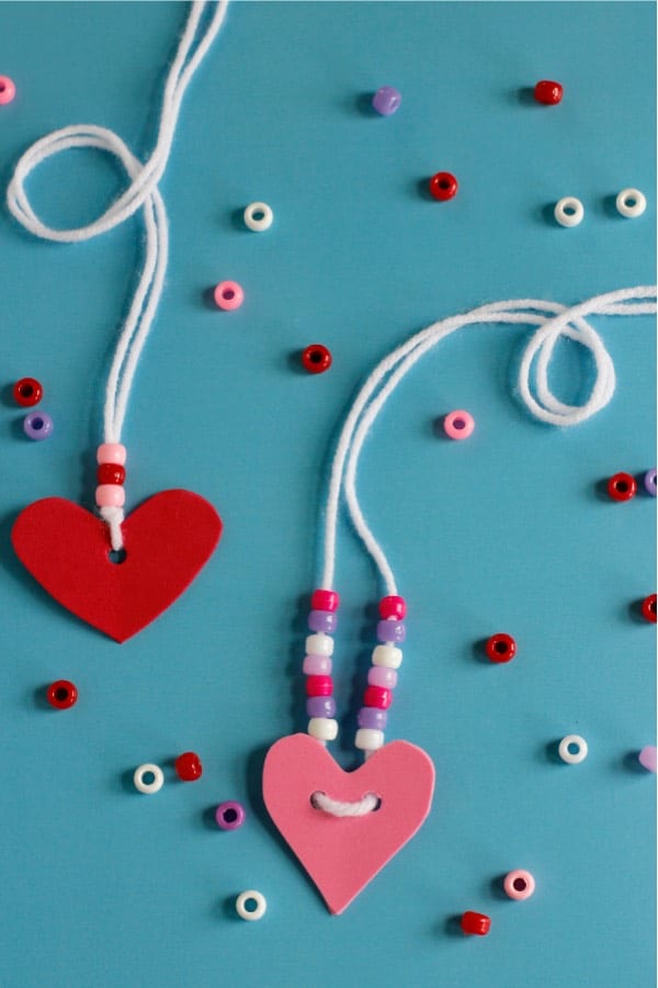 yarn and bead necklace craft for young kids