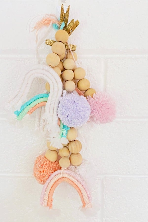 oil diffuser craft with yarn pompoms